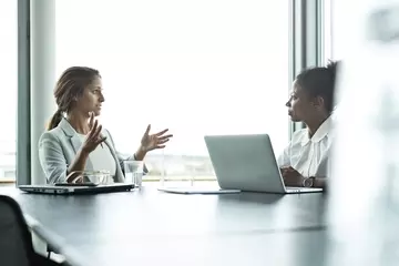 A manager meets with a problem employee about poor performance