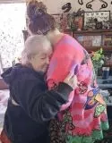 Layla Morales and her grandmother hug