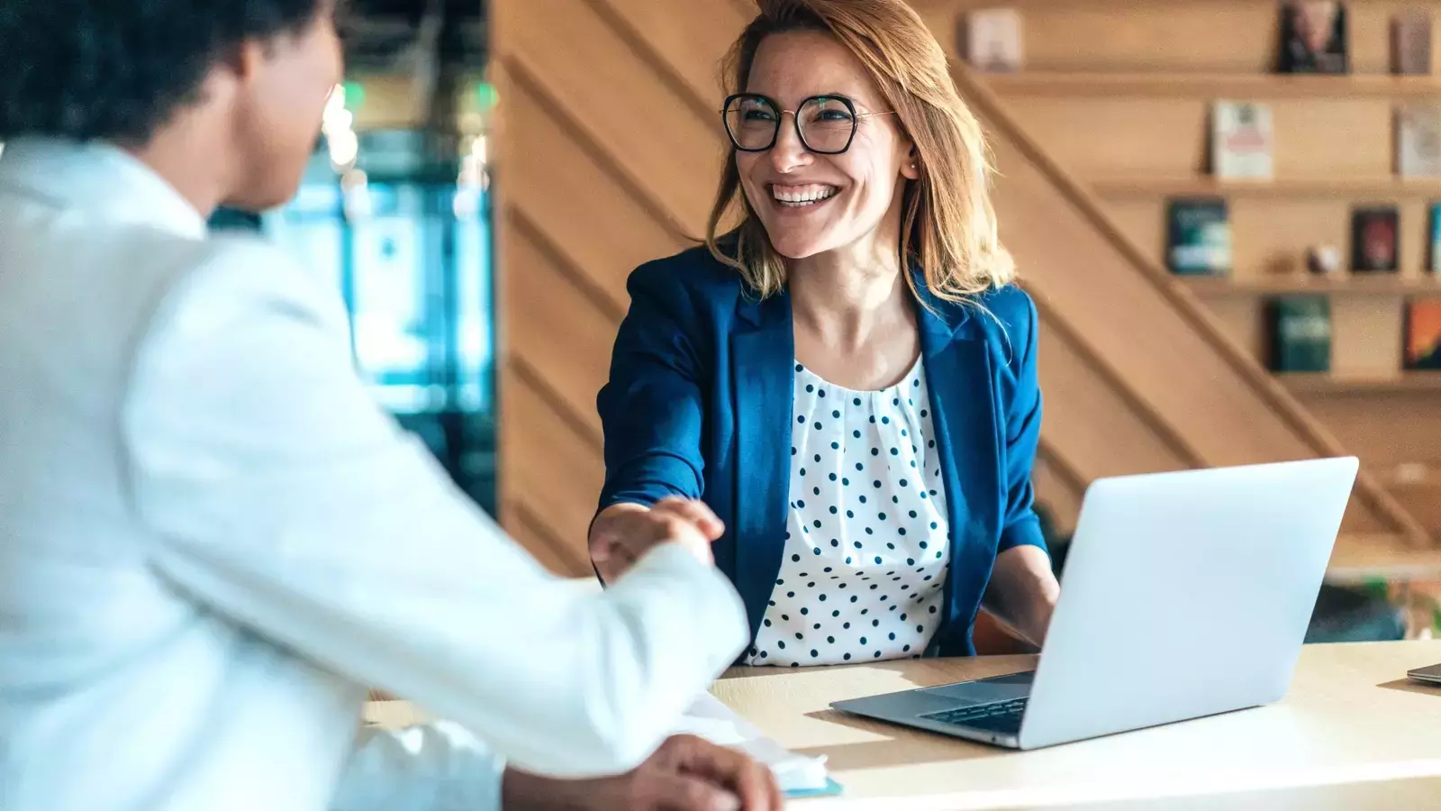 Business people shaking hands in the office during a job interview