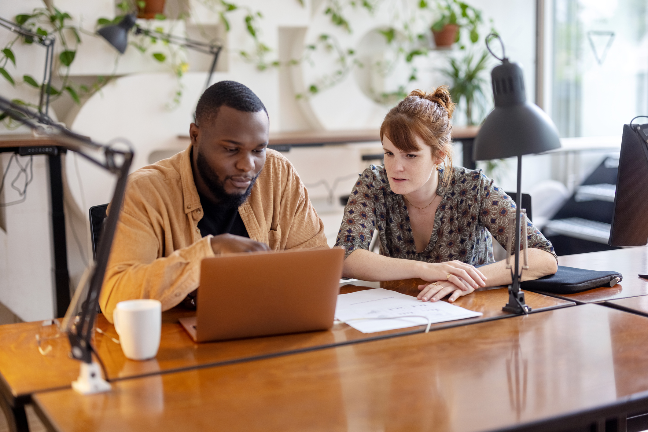 Two employees working together