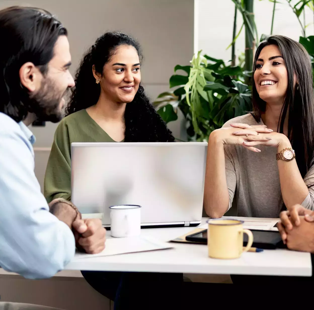 employees sitting at a table